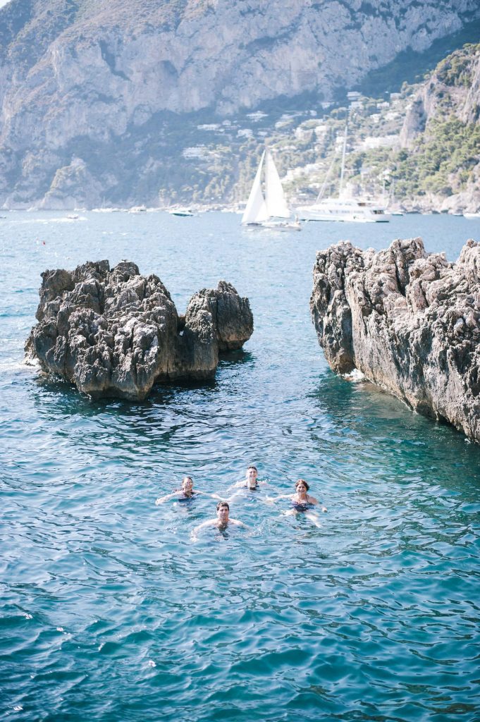 Swimming at La Fontelina in Capri at this Positano wedding weekend in Villa Tre Ville | Photo by Gianni di Natale