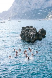 Swimming in Capri at this Positano wedding weekend in Villa Tre Ville | Photo by Gianni di Natale