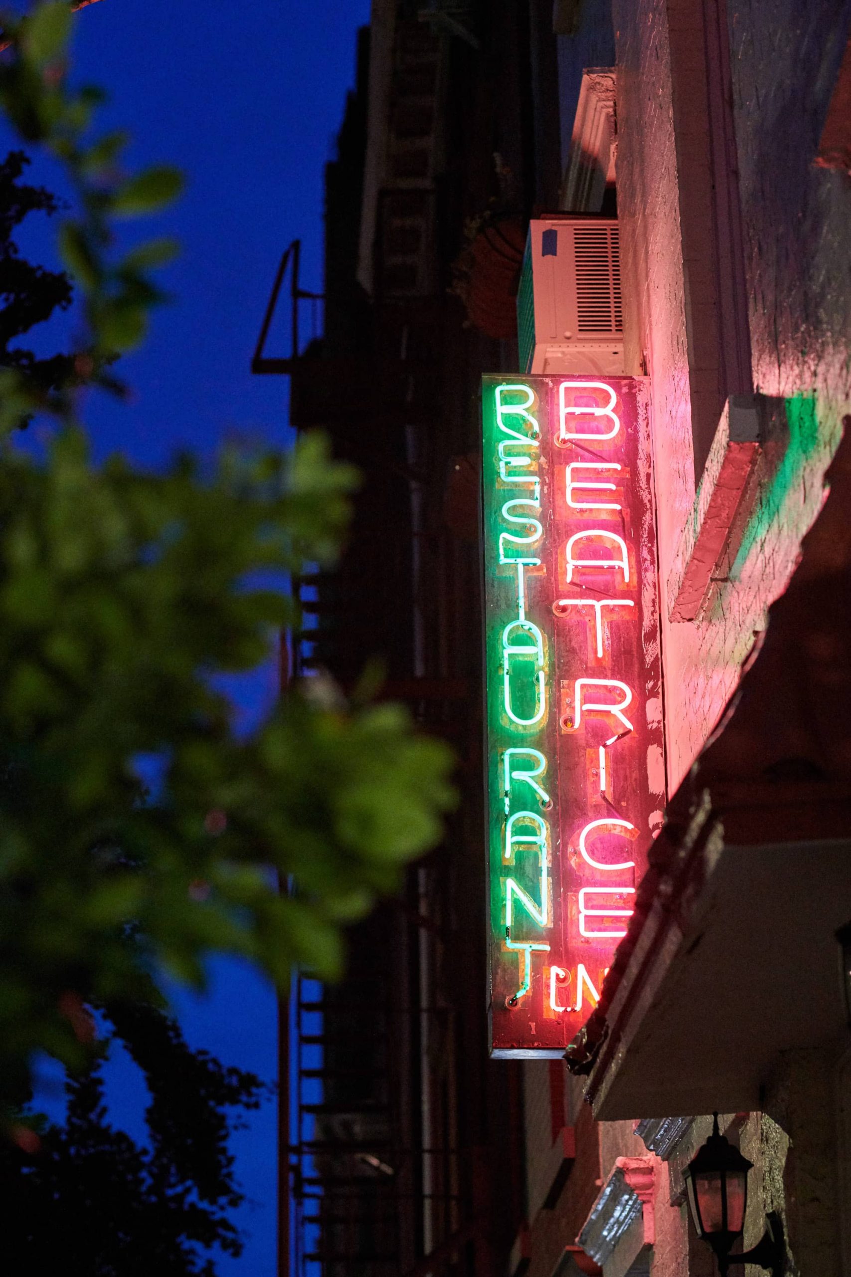 Beatrice Inn Restaurant neon sign at this 40th surprise birthday party at Beatrice Inn in West Village | Photo by Darren Ornitz