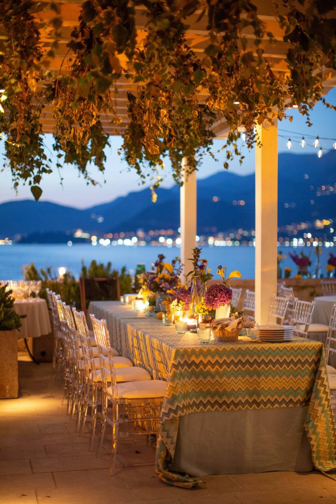 Decor for a 60s-themed welcome party at this Aman Sveti Stefan Montenegro destination wedding weekend | Photo by Allan Zepeda
