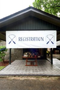 Field day registration at this camp-themed wedding weekend at Cedar Lakes Estate in Upstate NY, USA | Photo by Christian Oth Studios