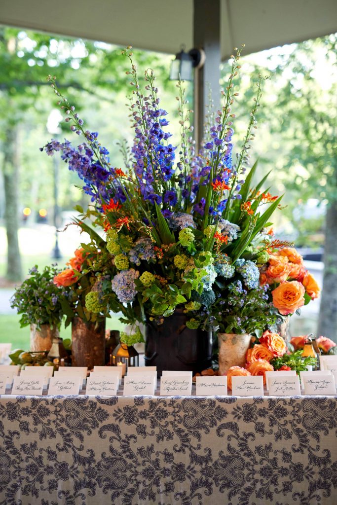 Welcome party table decor at this camp-themed wedding weekend at Cedar Lakes Estate in Upstate NY, USA | Photo by Christian Oth Studios