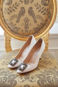 Bride's Manolo Blahnik satin jewel buckle heels at this classic autumn wedding at The Plaza in NYC | Photo by Christian Oth Studio