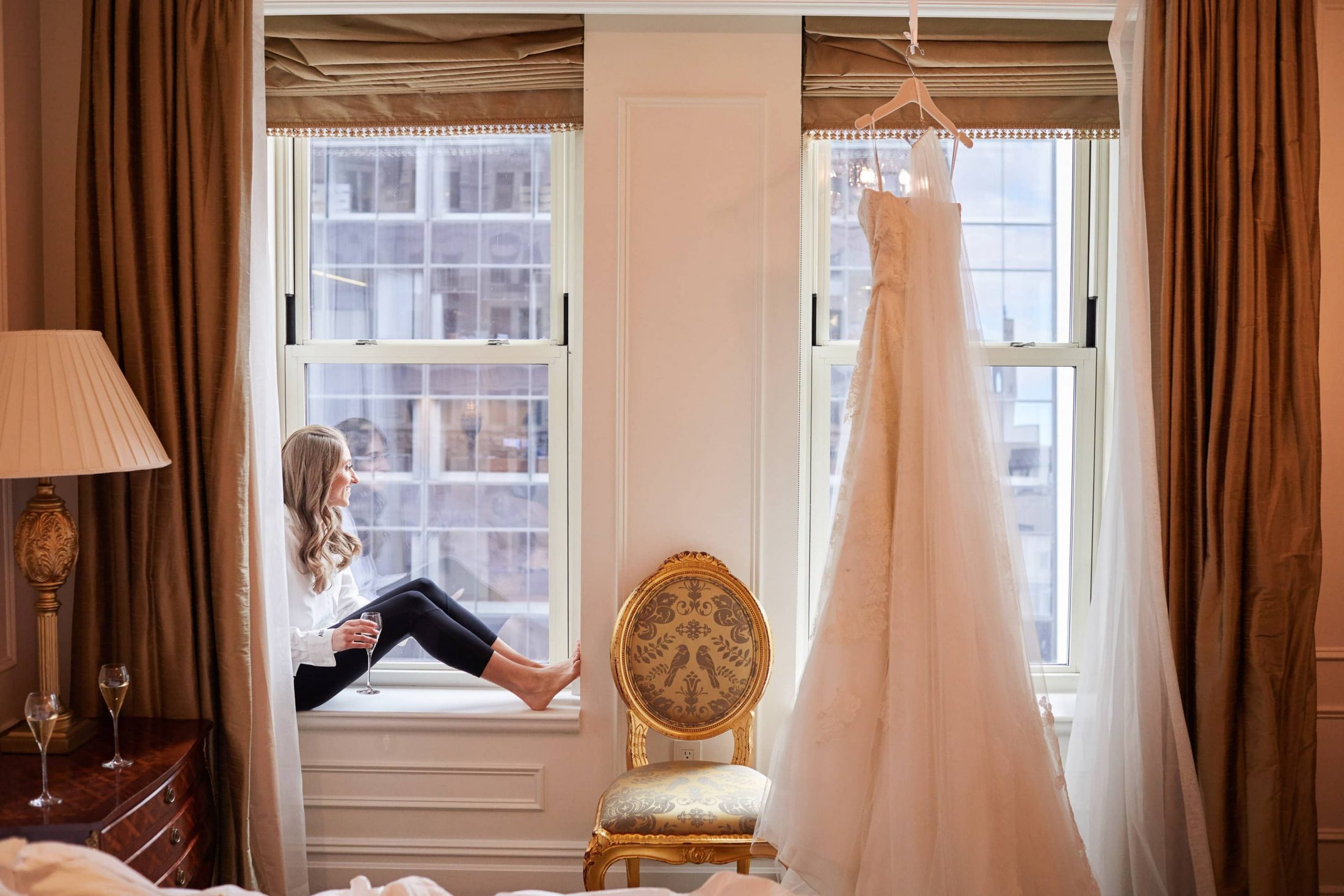 Bride getting ready at this classic autumn wedding at The Plaza in NYC | Photo by Christian Oth Studio
