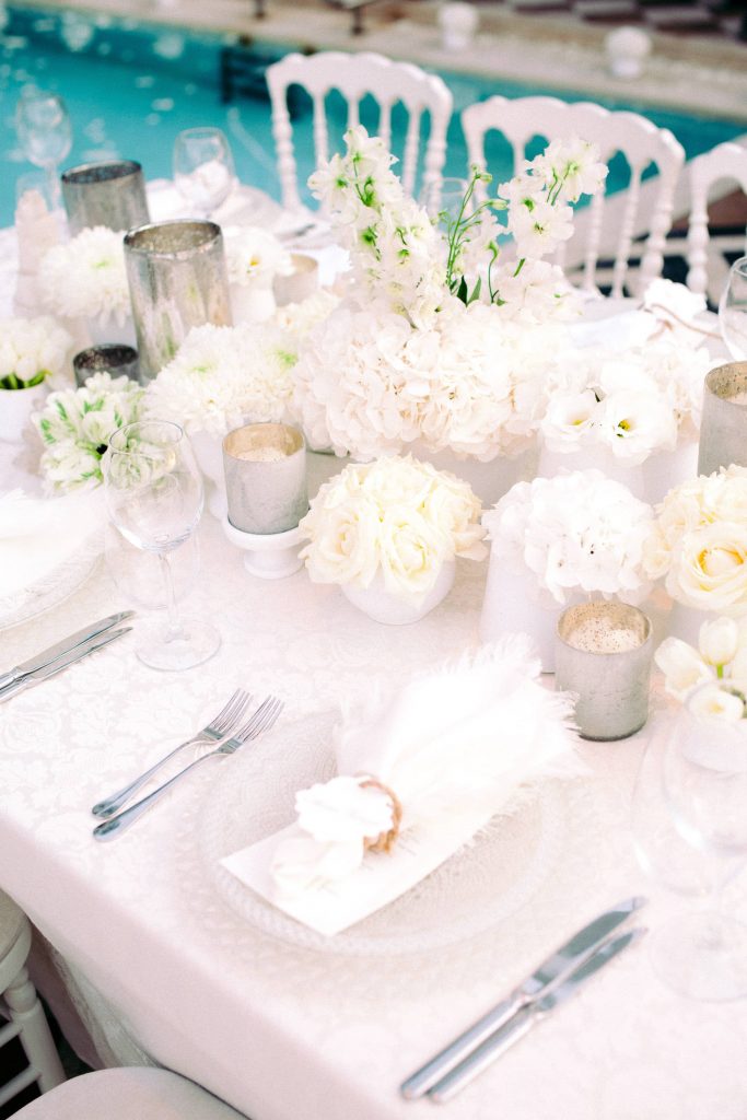 White party table and floor decor at this Istanbul wedding weekend at Four Seasons Bosphorus | Photo by Allan Zepeda