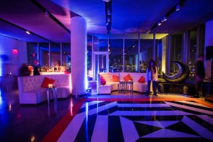 Dance floor and lounge area for the haunted Studio 54 at this epic halloween party at The Standard in NYC | Photo by Gruber Photographers
