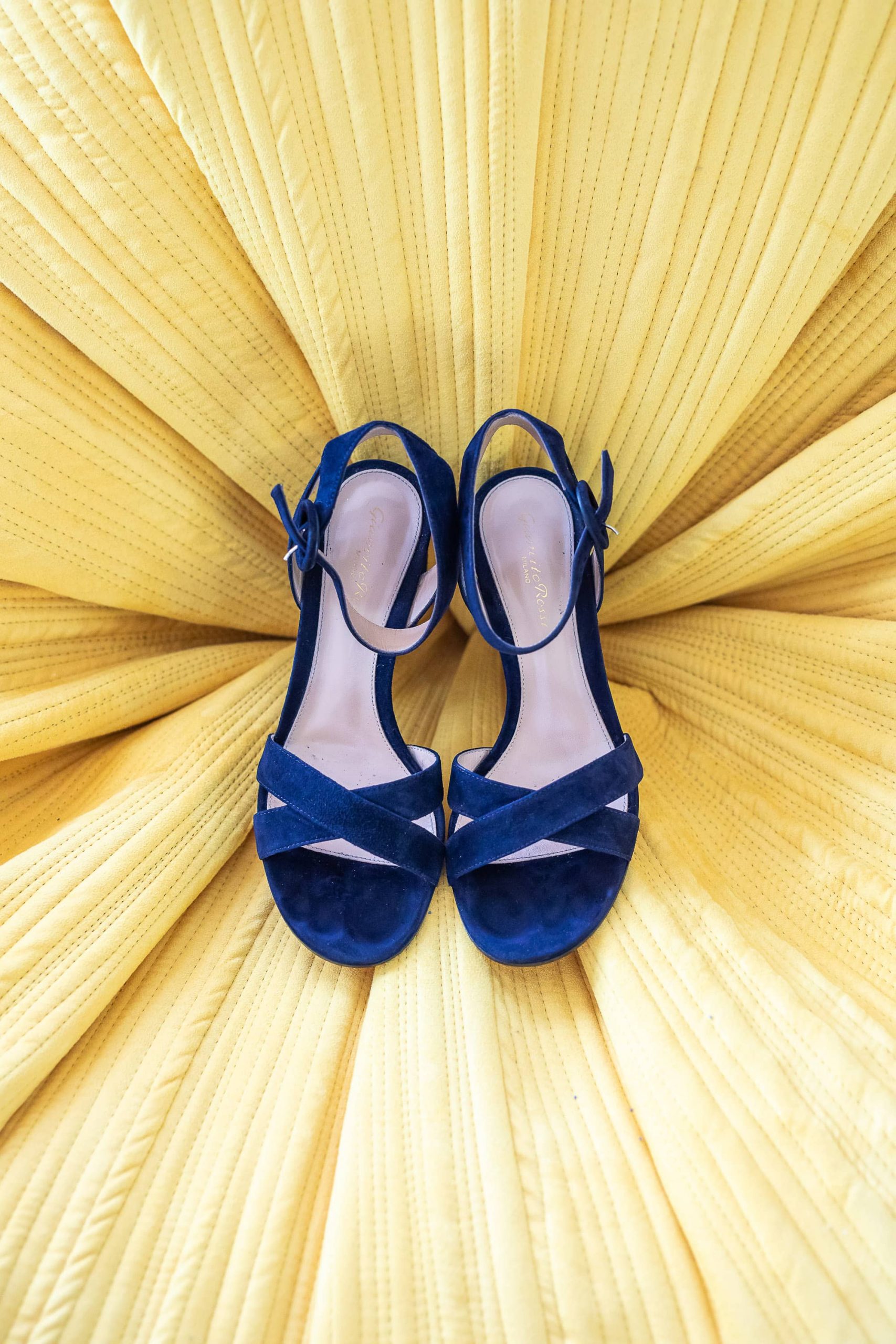 Something blue -- the bride's shoes at this Hamptons wedding weekend held at The Parrish Museum | Photo by Roey Yohai Studio