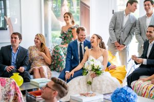 Bride and groom with family and friends at this Hamptons wedding weekend held at The Parrish Museum | Photo by Roey Yohai Studio