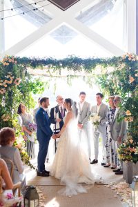 Bride and groom at Jewish ceremony at this Hamptons wedding weekend held at The Parrish Museum | Photo by Roey Yohai Studio