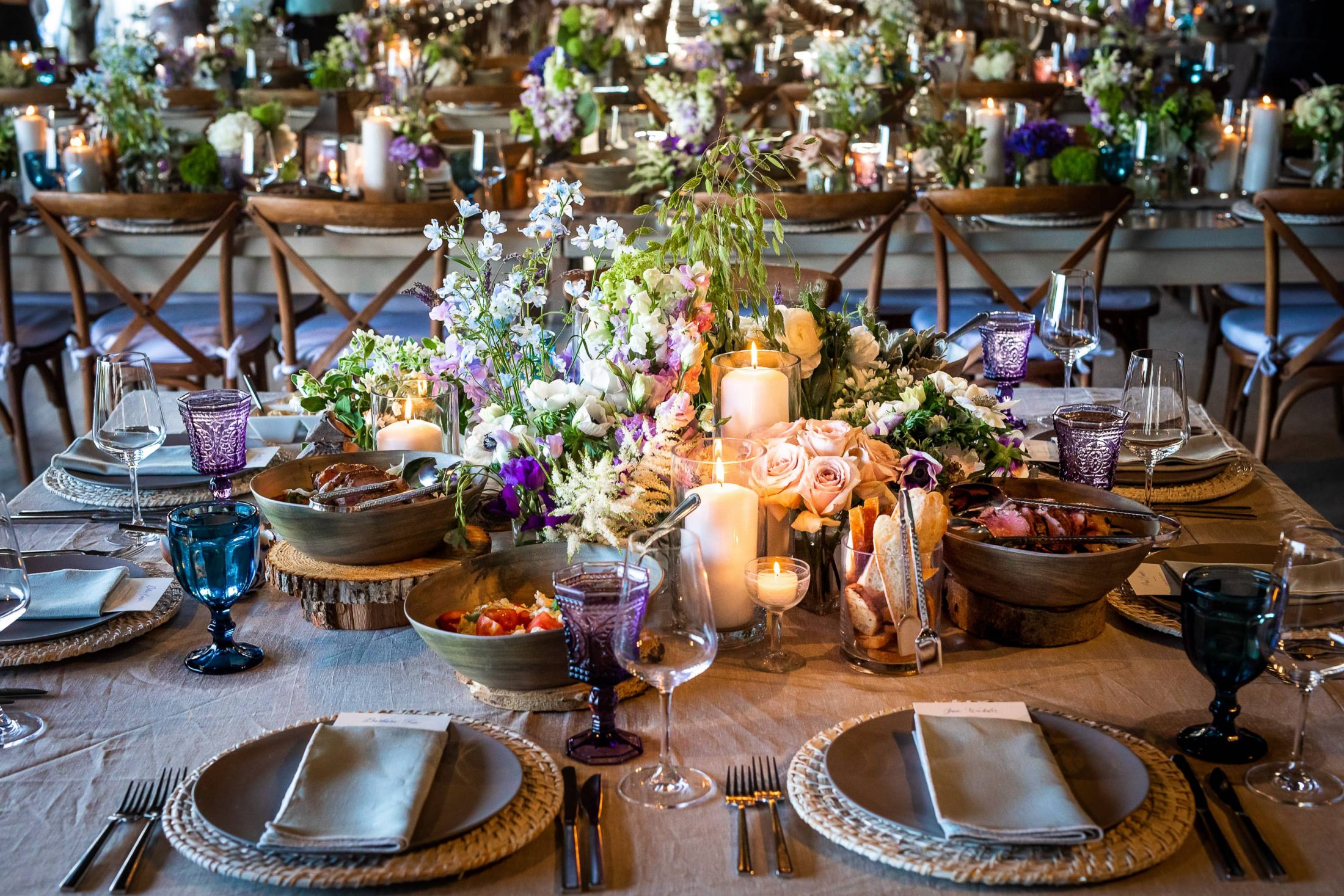 Reception floral table decor at this Hamptons wedding weekend held at The Parrish Museum | Photo by Roey Yohai Studio