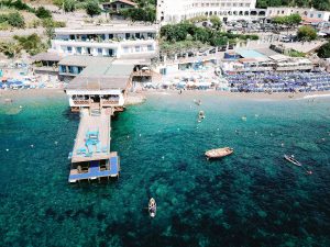 Aerial view of Amalfi Coast wedding weekend held Lo Scoglio | Photo by Allan Zepeda