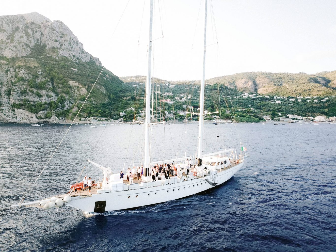 Sunset sail to Capri at this Amalfi Coast wedding weekend held Lo Scoglio | Photo by Allan Zepeda