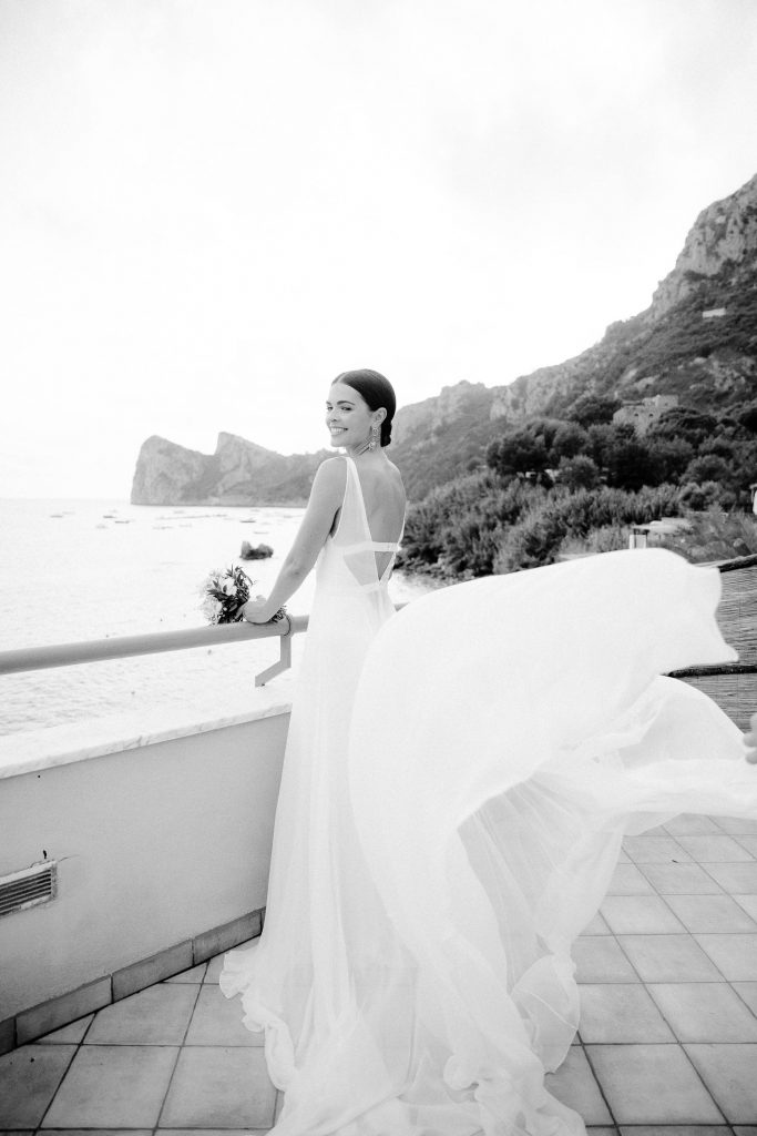 Bride at this Amalfi Coast wedding weekend held Lo Scoglio | Photo by Allan Zepeda