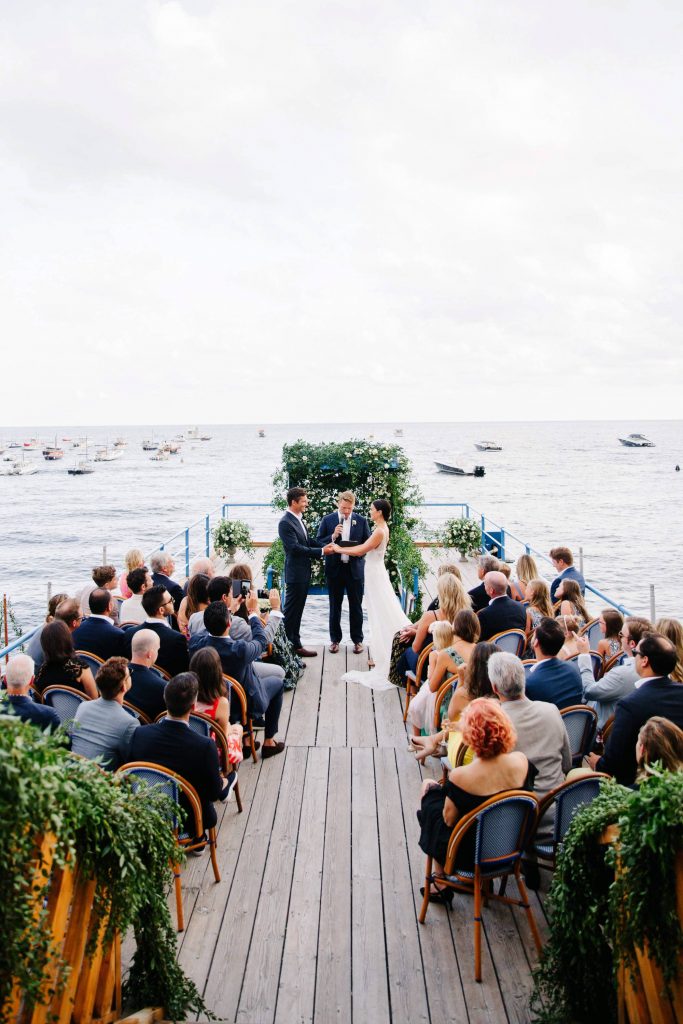 The ceremony at Lo Scolgio's deck overlooking the sea at this Amalfi Coast wedding weekend | Photo by Allan Zepeda