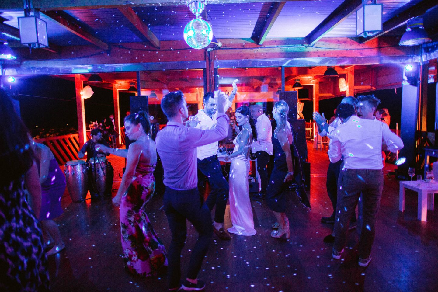 Guests dancing during reception at this Amalfi Coast wedding weekend held Lo Scoglio | Photo by Allan Zepeda