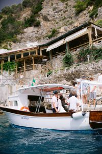 Beach party near Conca del Sogno at this Amalfi Coast wedding weekend held Lo Scoglio | Photo by Allan Zepeda