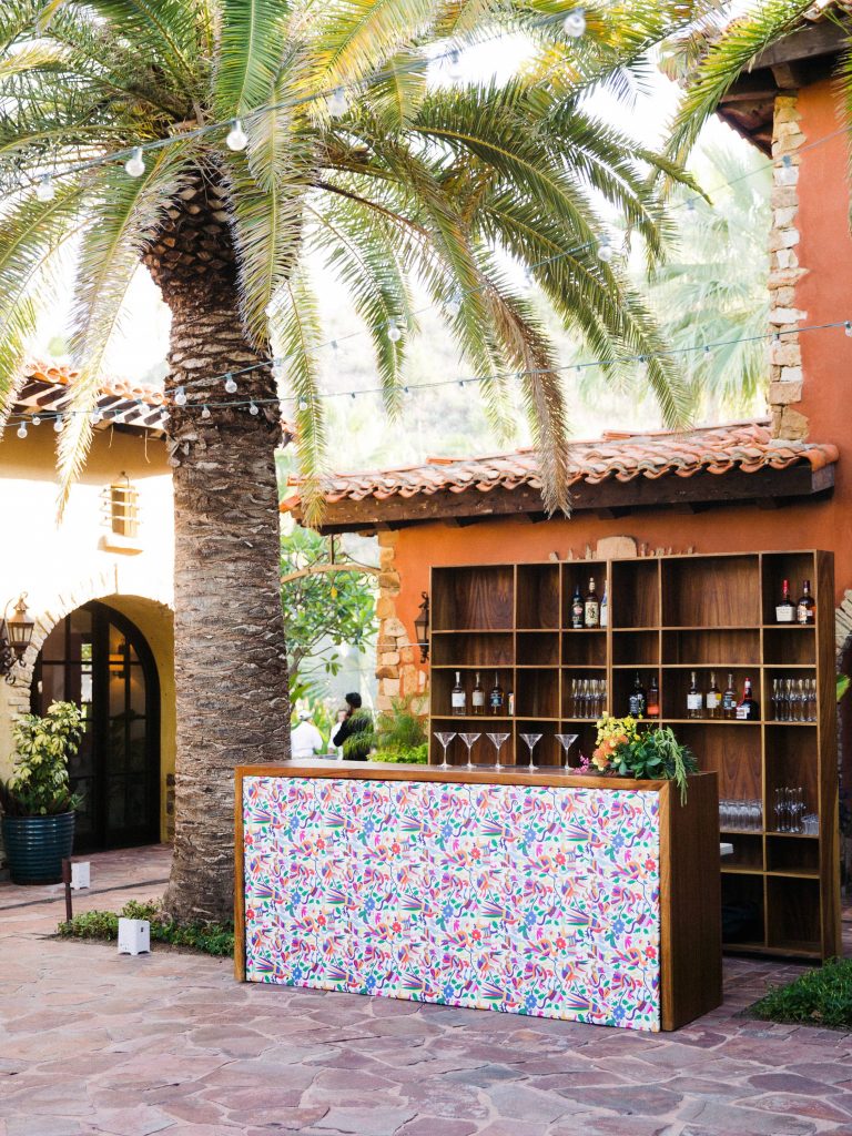 Colorful bar at this Los Cabos wedding in Mexico | Photo by Allan Zepeda