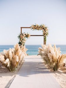 Beautiful ceremony on the beach at this Los Cabos wedding in Mexico | Photo by Allan Zepeda