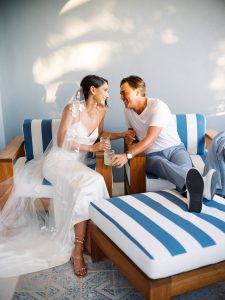 Newlyweds lounging at this Los Cabos wedding in Mexico | Photo by Allan Zepeda