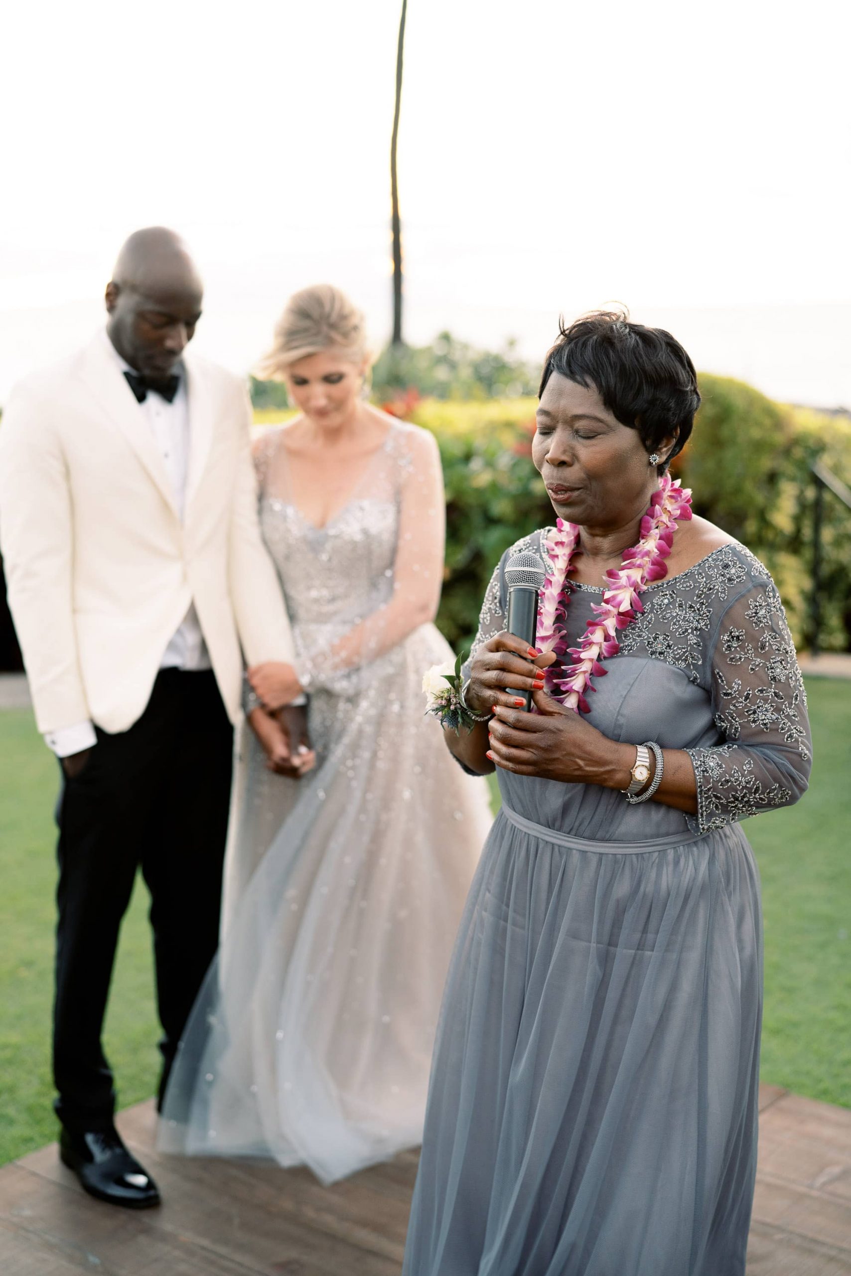 Prayers at reception at Maui wedding at Four Seasons Resort Maui in Wailea, Hawaii | Photo by James x Schulze