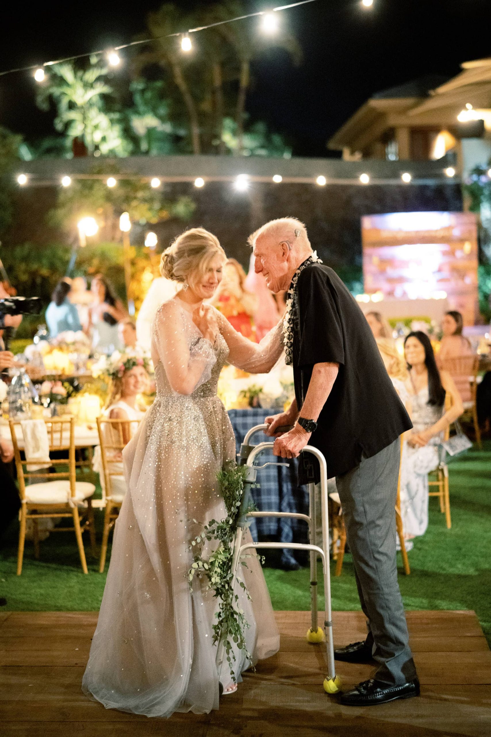 Bride and father during reception at Maui wedding at Four Seasons Resort Maui in Wailea, Hawaii | Photo by James x Schulze