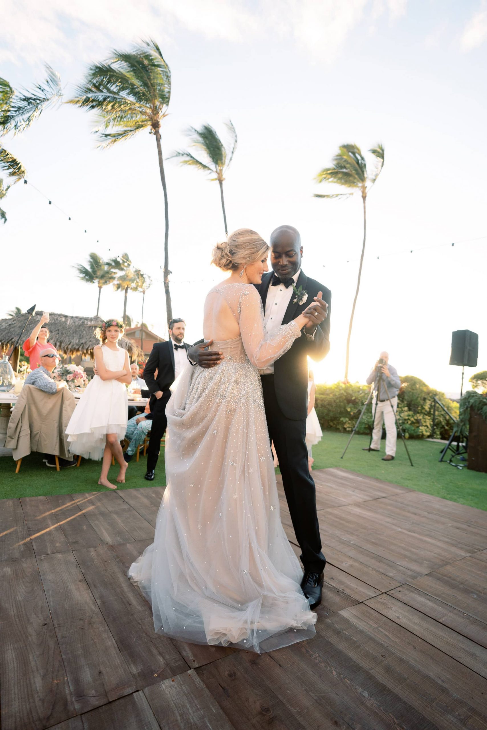 Bride and groom first dance during reception at Maui wedding at Four Seasons Resort Maui in Wailea, Hawaii | Photo by James x Schulze