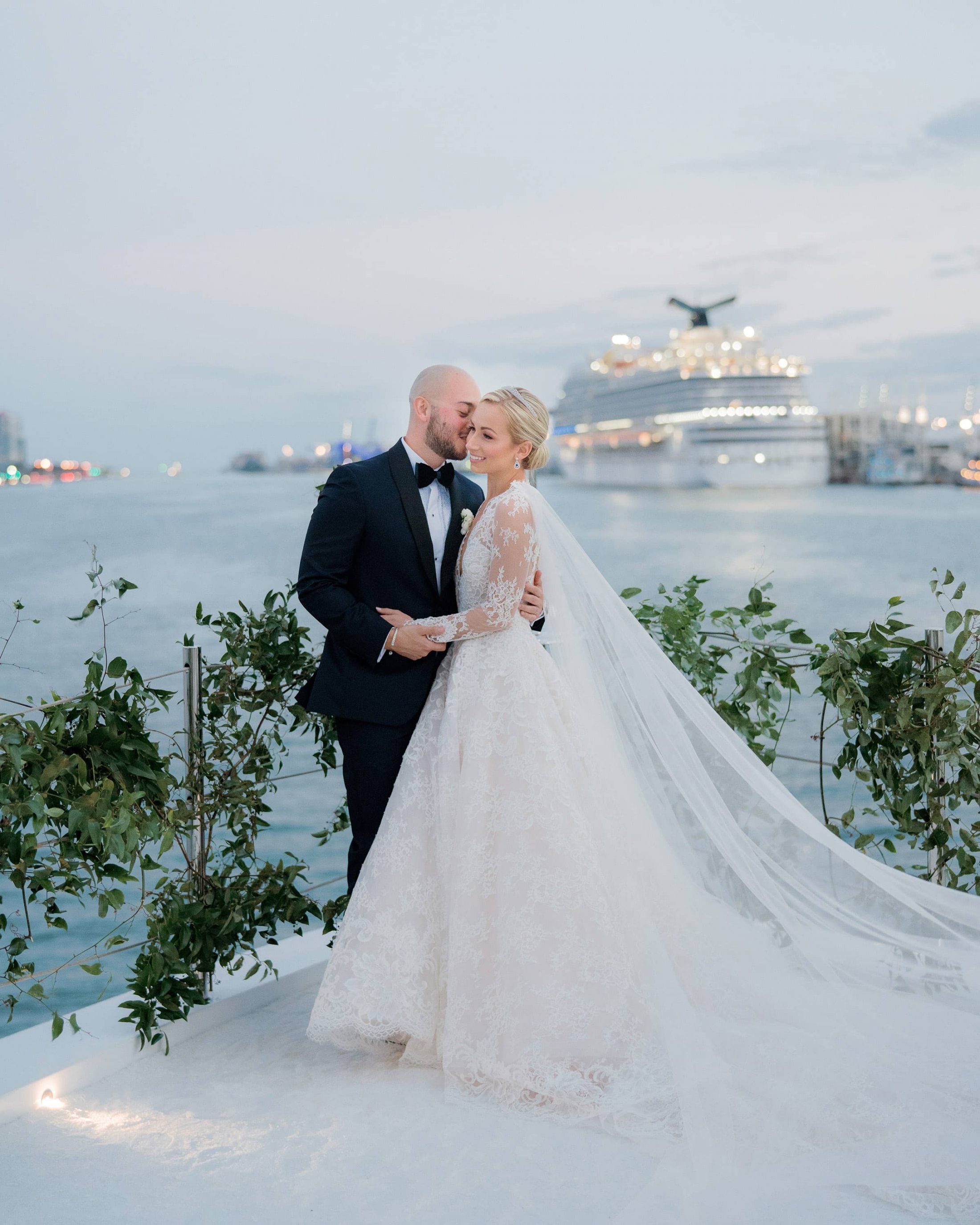 Bride and groom at this Miami yacht wedding | Photo by Corbin Gurkin