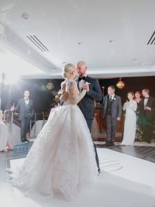 Bride and groom first dance during reception at this Miami yacht wedding | Photo by Corbin Gurkin