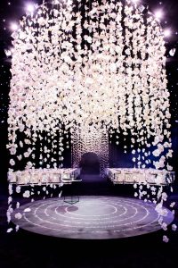 Chuppah made of hanging white orchards at this NYE wedding in New York City | Photo by Gruber Photo