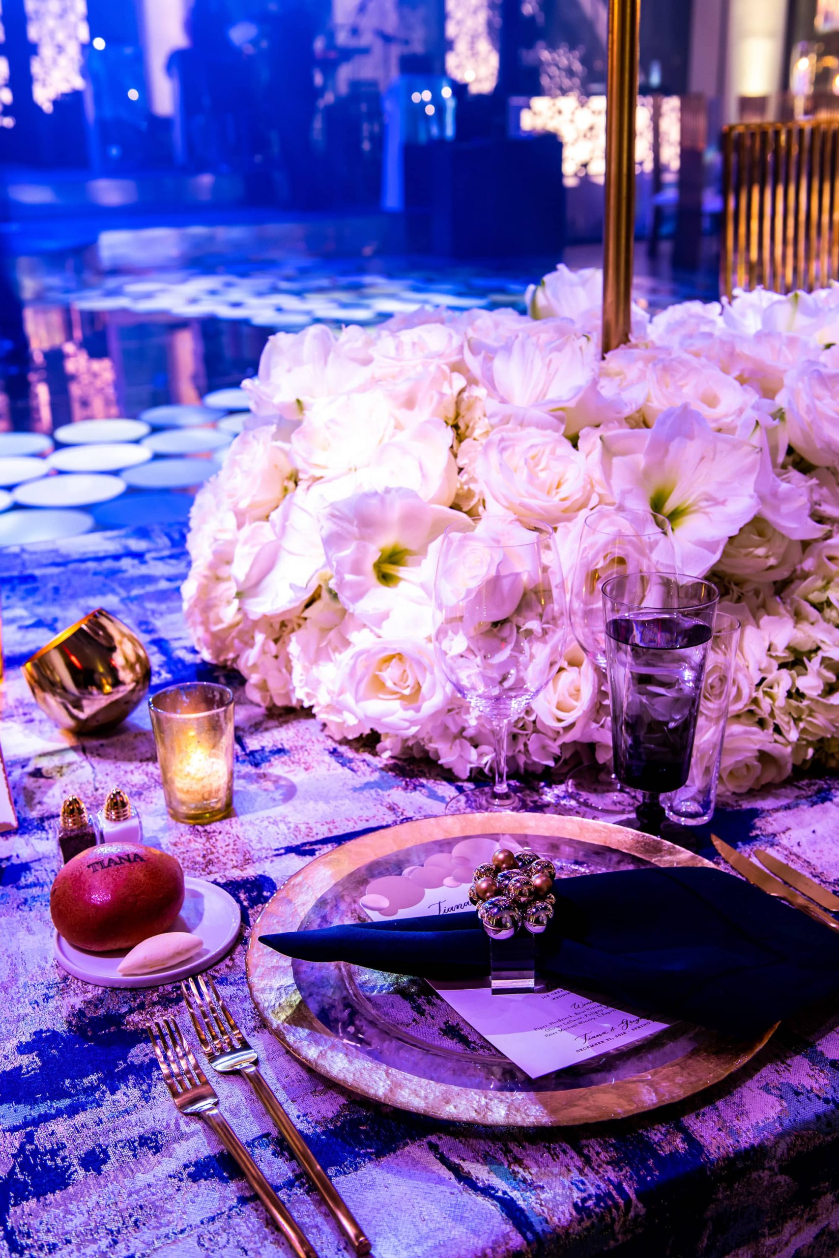 Table decor at champagne bottle-inspired reception at this NYE wedding in New York City | Photo by Gruber Photo