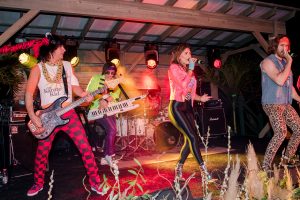 Jessie's Girl, an 80s tribute band from NYC, at this Sea Island wedding weekend in Georgia, USA | Photo by Liz Banfield