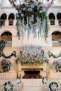 Cascading blue flowers at The Cloister ceremony at this Sea Island wedding weekend in Georgia, USA | Photo by Liz Banfield